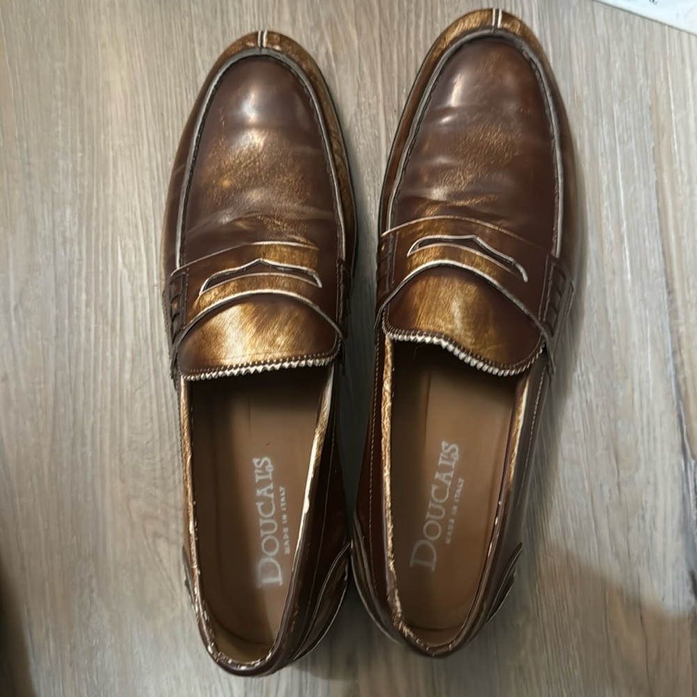 Doucal’s distressed loafers (brown).